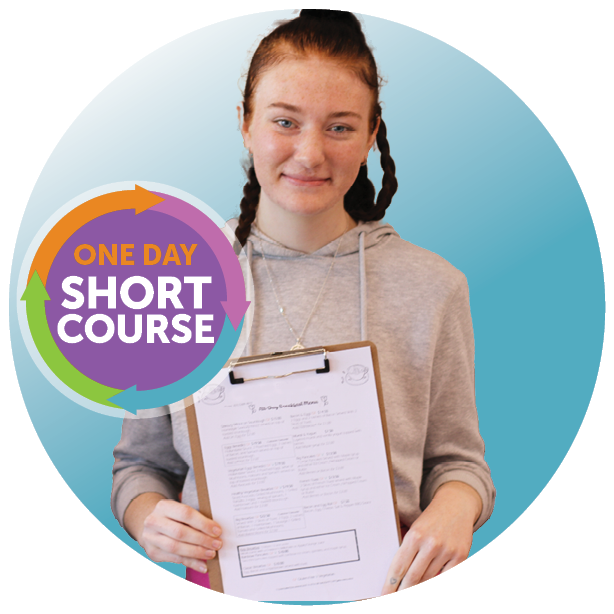 Young woman smiling holding clipboard